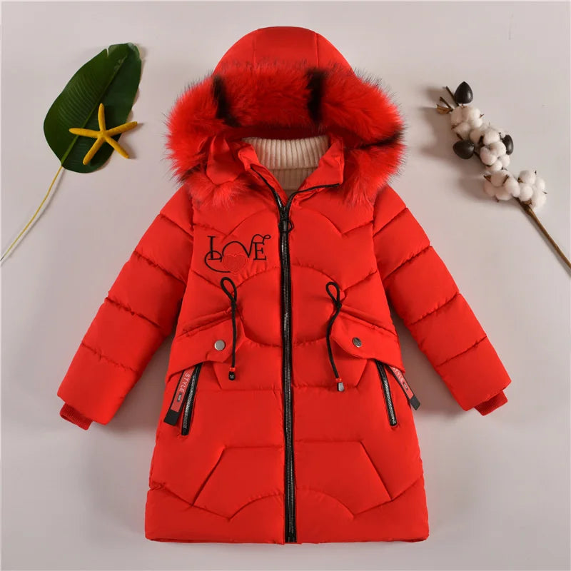 Red winter coat with fur-lined hood on a light gray background
