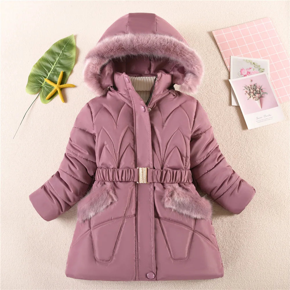 Pink winter coat with fur trim on a light background