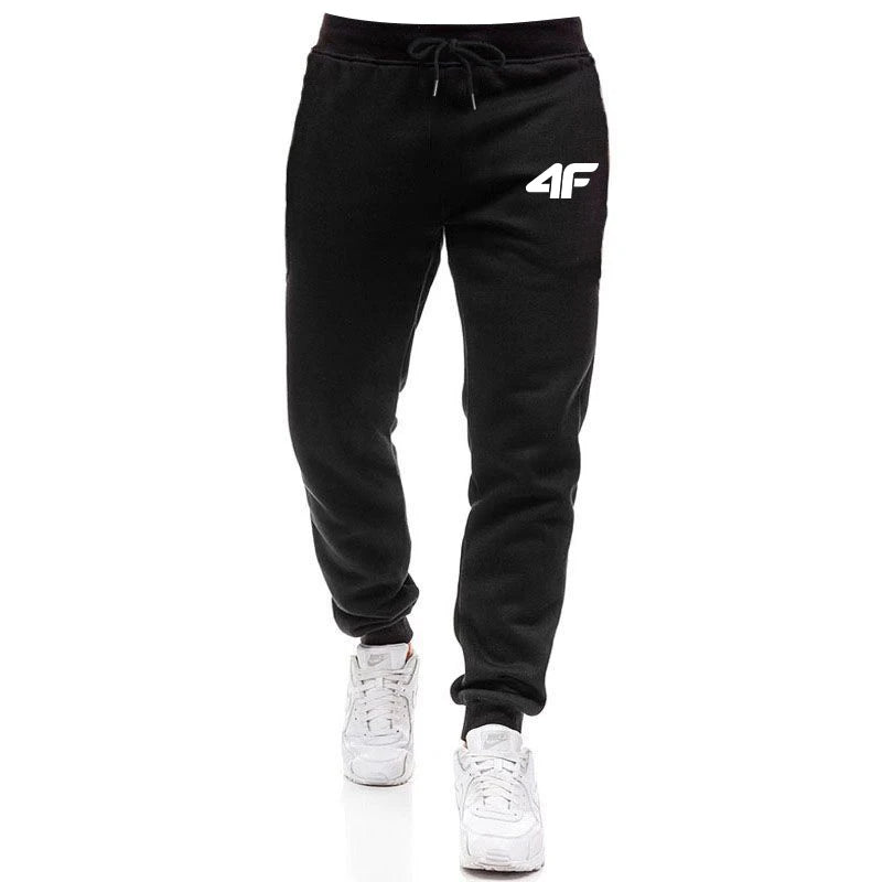 Black jogger pants with a logo on a white background