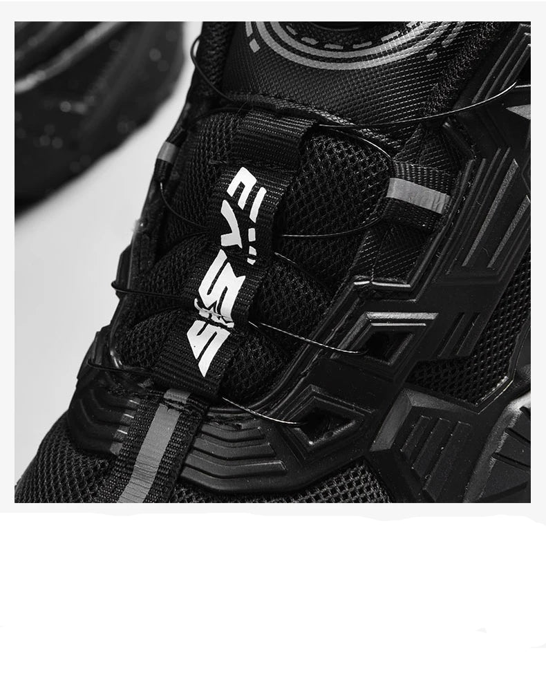 Black sneaker with a brand logo on a white background
