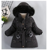 Black winter coat with fur hood on a light gray background