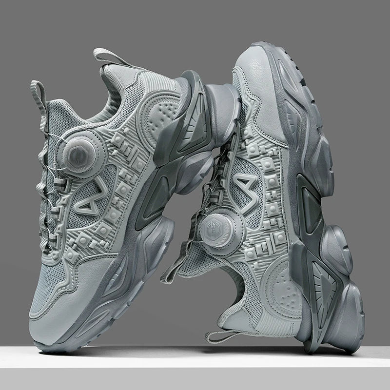 Gray sneakers with geometric patterns on a gray background