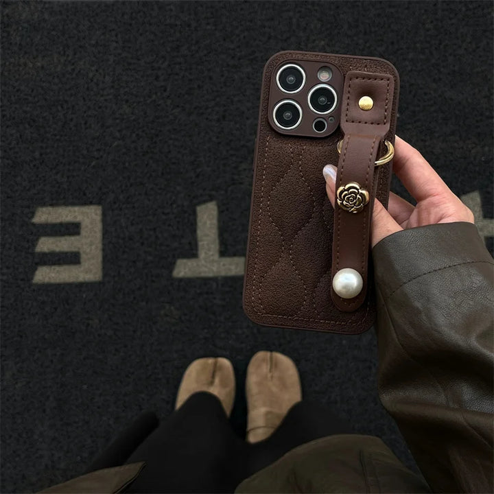 Luxury PU Leather Down Jacket Phone Case with Flower Wrist Strap for iPhone 15 Pro Max