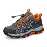Gray and orange hiking shoe with 'UOVO' branding on a white background