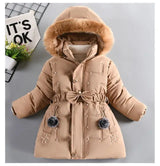 Beige winter coat with fur-lined hood on a gray background