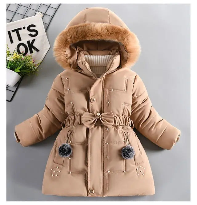 Beige winter coat with fur-lined hood on a gray background