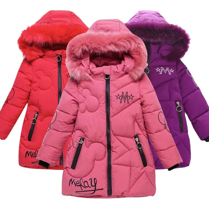Three children's winter jackets in red, pink, and purple with fur-lined hoods on a white background.