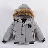 Gray children's winter jacket with fur-lined hood on a white background