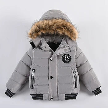 Gray children's winter jacket with fur-lined hood on a white background