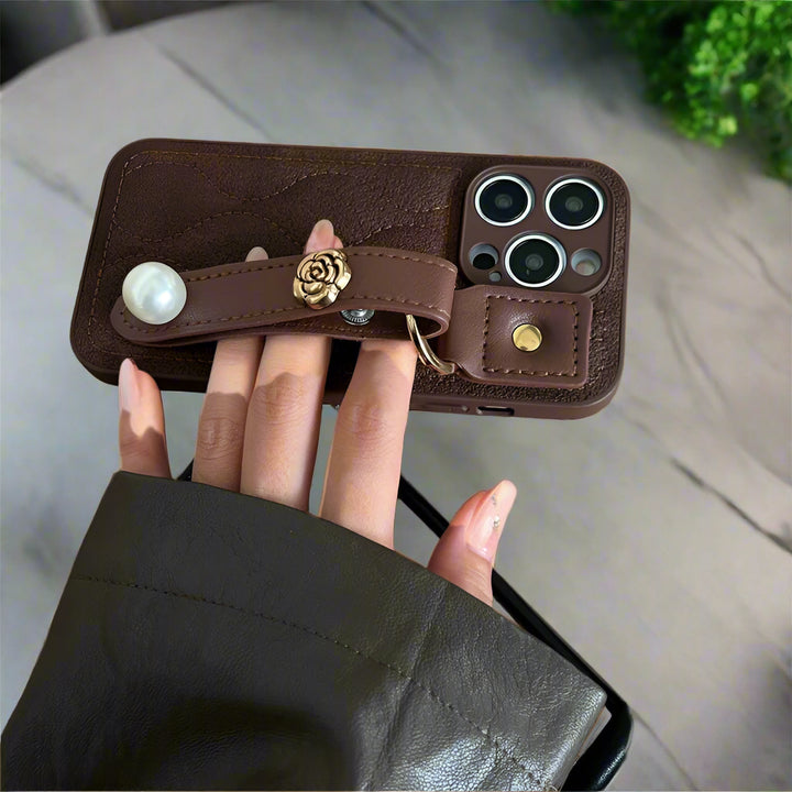 Luxury PU Leather Down Jacket Phone Case with Flower Wrist Strap for iPhone 15 Pro Max
