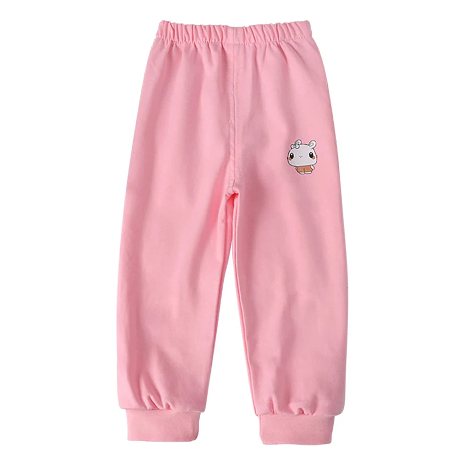 Pink sweatpants with a small cartoon character on a white background