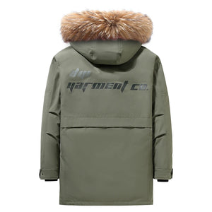 Green parka jacket with fur hood on a white background