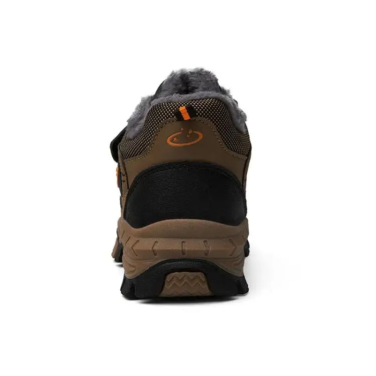 Brown winter boot with fur lining on a white background