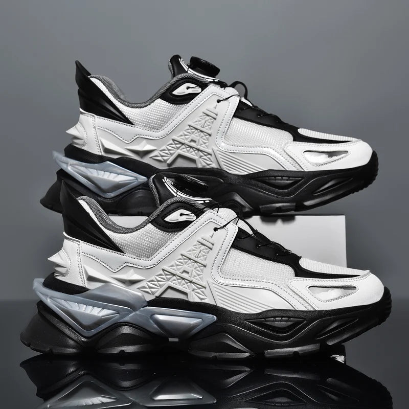 Pair of black and white sneakers on a reflective surface with a gray background