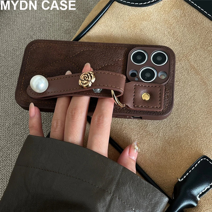 Luxury PU Leather Down Jacket Phone Case with Flower Wrist Strap for iPhone 15 Pro Max