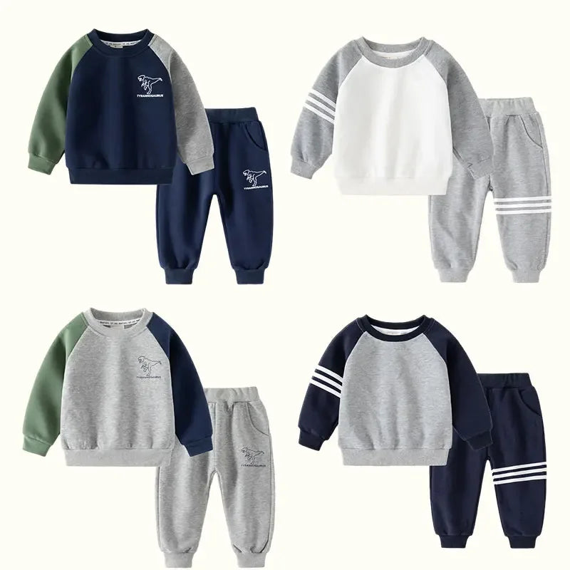 Set of children's sweatshirt and pants outfits in various colors on a white background