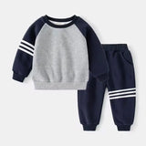 Children's sweatshirt and pants set with navy and gray colors on a white background