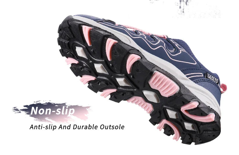Navy and pink sneaker with a focus on the sole, labeled 'Non-slip' and 'Anti-slip And Durable Outsole'.