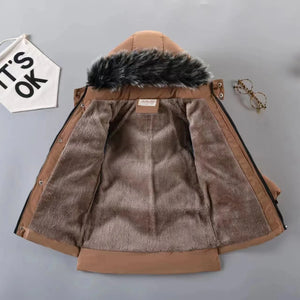 Brown jacket with fur hood on a gray background