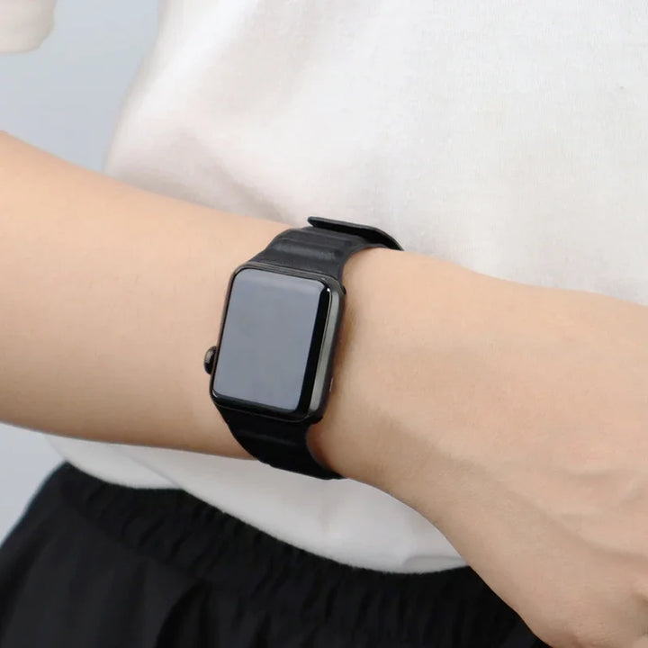 Stylish genuine leather Apple Watch band with magnetic loop closure, available in multiple colors.
