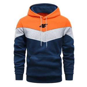 Color-blocked hoodie with orange, blue, and gray sections on a white background