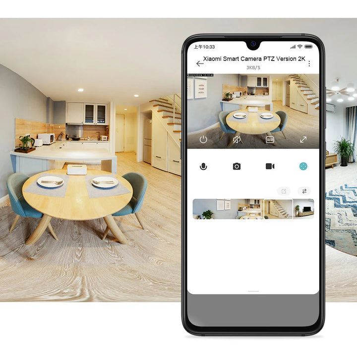 Smart home security camera app on a smartphone displaying a live view of a modern kitchen.