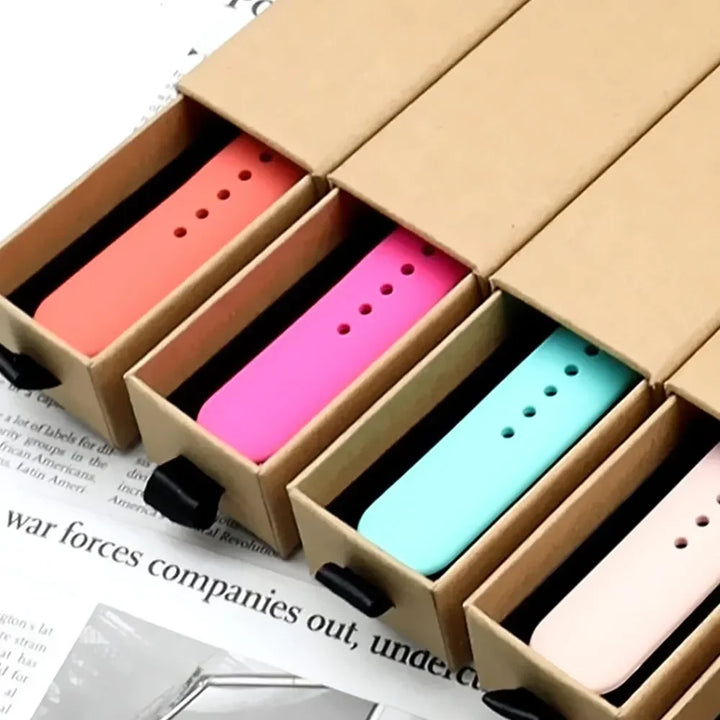 Silicone sport band for Apple Watch, compatible with Series 9/8/7/6/5/SE/Ultra, shown in vibrant colors.