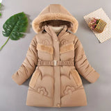 Beige winter coat with fur-lined hood on a gray background