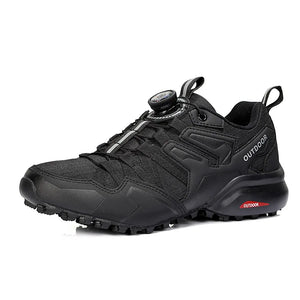 Black outdoor sneaker with visible brand name on a white background