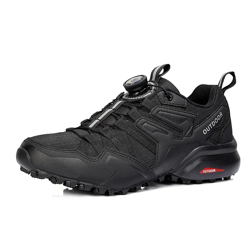 Black outdoor sneaker with visible brand name on a white background