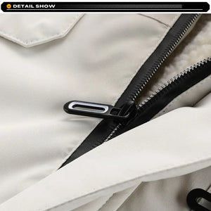 Close-up of a black zipper on a beige jacket with 'YAHOUFANYA' branding.