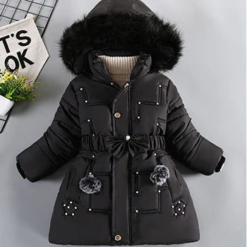 Black winter coat with fur hood on a gray background