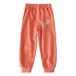 Coral sweatpants with a small logo on a white background