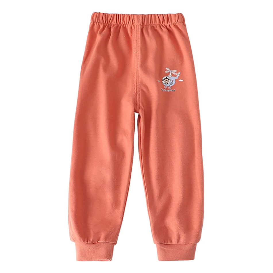 Coral sweatpants with a small logo on a white background