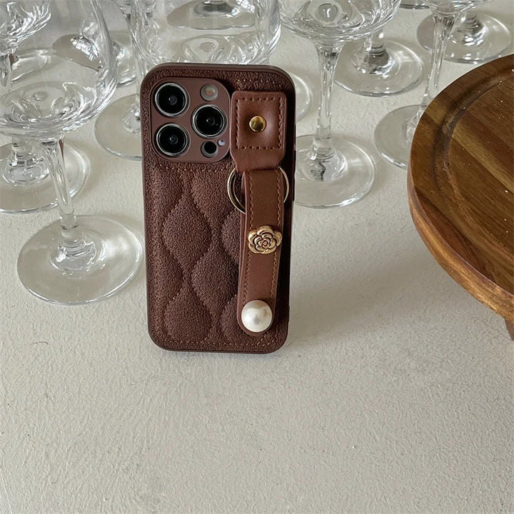 Luxury PU Leather Down Jacket Phone Case with Flower Wrist Strap for iPhone 15 Pro Max