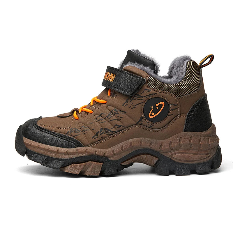 Brown children's hiking boot with gray lining and orange accents on a white background