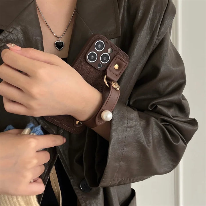 Luxury PU Leather Down Jacket Phone Case with Flower Wrist Strap for iPhone 15 Pro Max