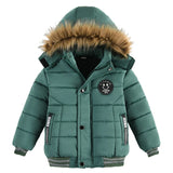 Green children's puffer jacket with fur-lined hood on a white background
