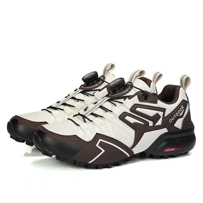 Pair of white and brown outdoor sneakers on a white background