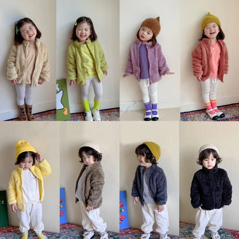 Collage of a child in various outfits with different colored jackets and hats.