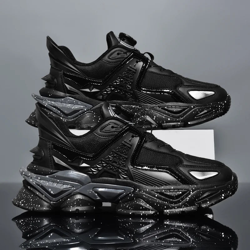 Stack of black and gray sneakers on a reflective surface with a gray background