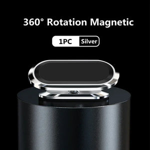 Silver 360-degree rotation magnetic phone holder on a black background