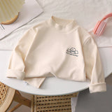 Beige long-sleeve shirt with a logo on a white surface