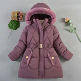 Purple winter coat with pink fur hood on a gray background