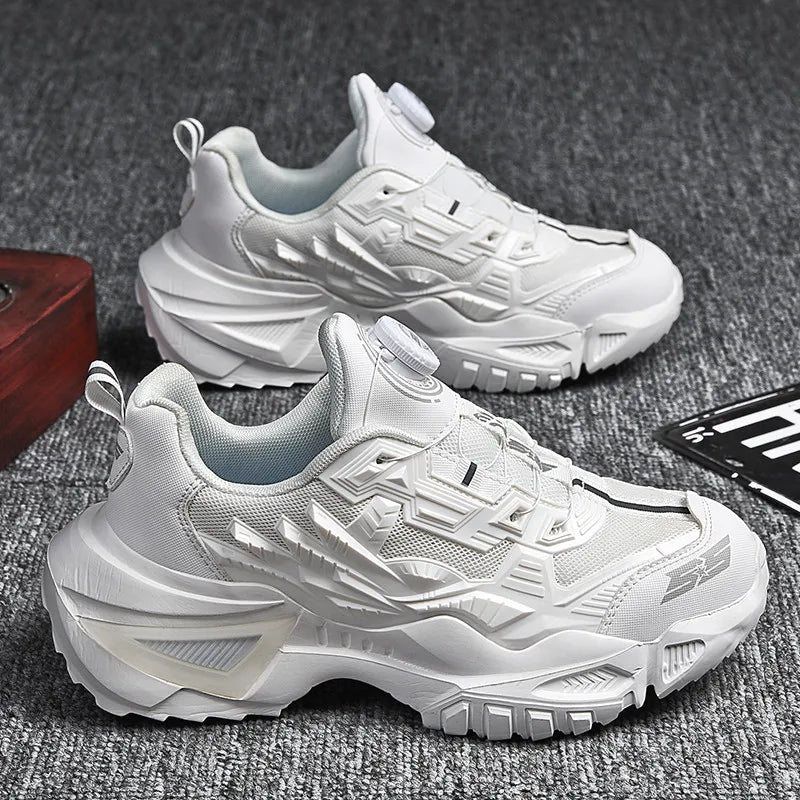 White sneakers on a textured gray surface