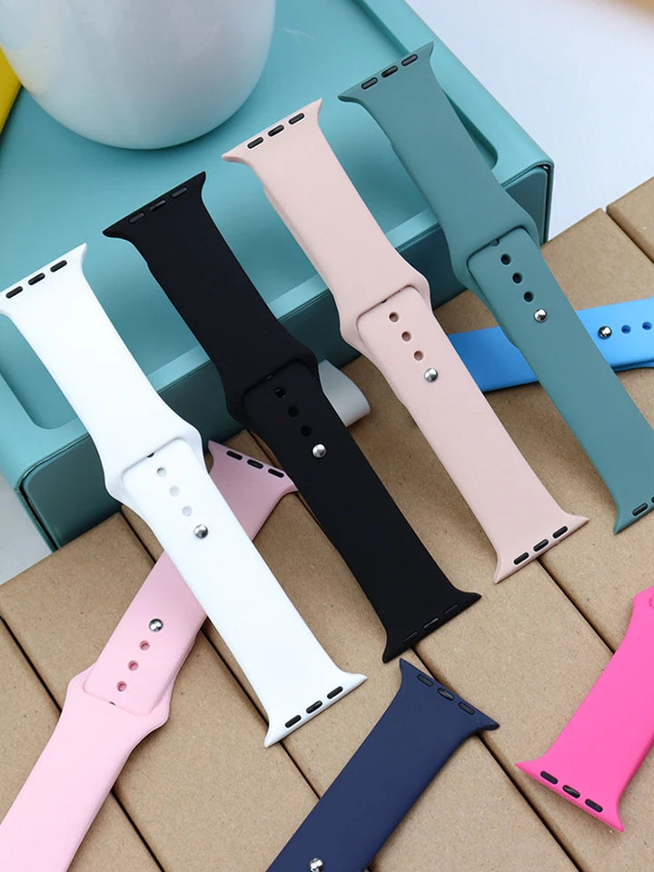 Silicone sport band for Apple Watch, compatible with Series 9/8/7/6/5/SE/Ultra, shown in vibrant colors.