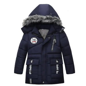 Navy blue winter coat with fur-lined hood on a white background