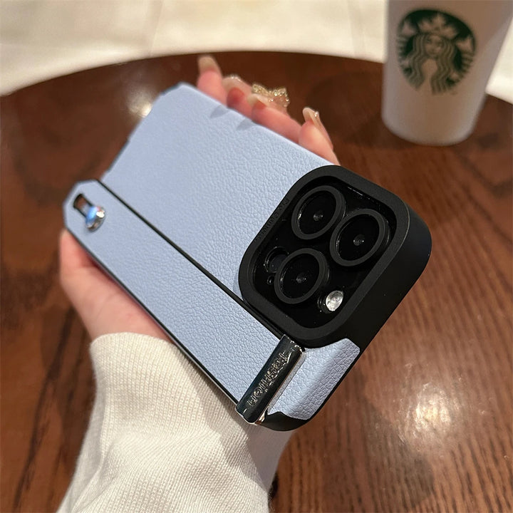 Luxury leather wrist strap stand iPhone case with full protection, fits iPhone 11, 12, 13, 14, 15, and 16 Pro Max & Plus.