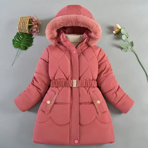 Pink children's winter coat with fur hood on a gray background