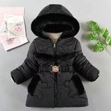 Black winter coat with fur trim on a light gray background